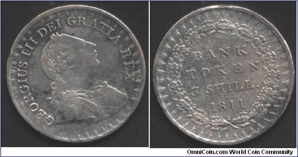 3s Bank of England token. Nice lightly toned circulated example