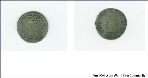 1768 half real, rough shape, but still a neat little coin.