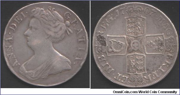 Crown of Queen Anne after the union with Scotland. Obverse 2 and reverse 2. `Septimo' edge.