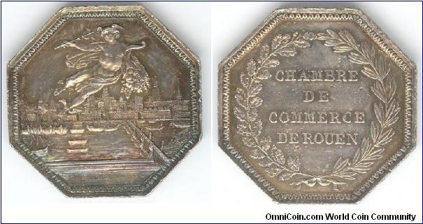A nicely toned city view jeton of Rouen. This time the obverse by Tiolier. Similar but subtly different view from that of the preceeding jeton. This one was restruck during the time frame 1845-60.