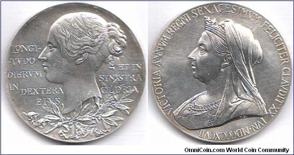 Large (56mm) silver medal commemorating Victoria's diamond jubilee. The yong head on the obverse is one of the best ever depictions of Queen Victoria (IMHO). Light marks and a few hairlines prevent me from saying that it's `unc'.