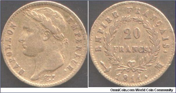 Napoleon gold 20 Francs of 1811 minted at Toulouse (M mint mark).Not quite VF in my opinion. Scarcer mint.