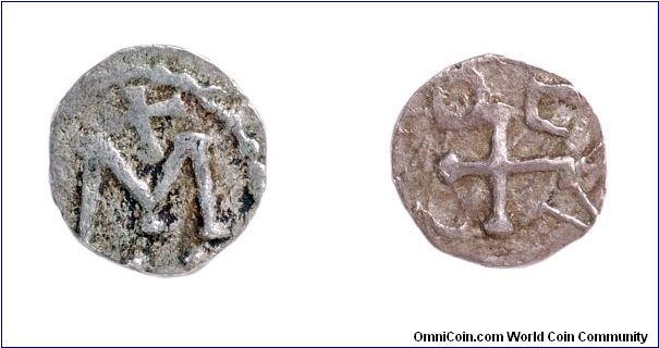 Merovingian denier from Marseille, ca 710 - 720 A.D.
Obv: Cross and M monogram.
Rev: Cross and OCAC