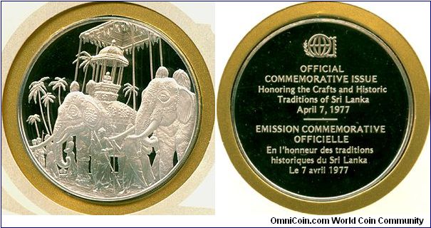 Crafts and Historic Traditions of Sri Lanka - International Society of Postmasters, Series 1977, Silver proof medallion, Franklin Mint.

Caparisoned elephants are decorated with gold plated head gears, colourful umbrellas, alavattom, venchamaram, necklaces, etc. during festivals.