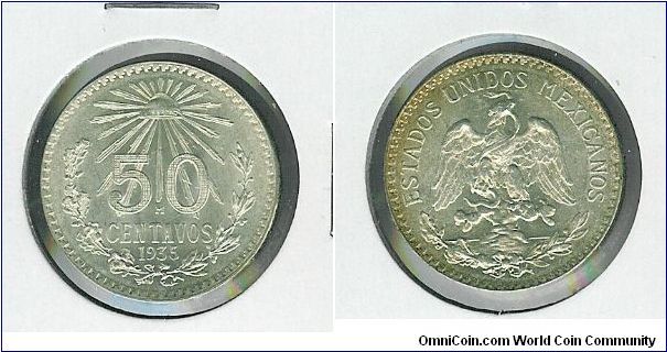 Silver 50 Centavos from Mexico. Nice gold toning on the rev rim.