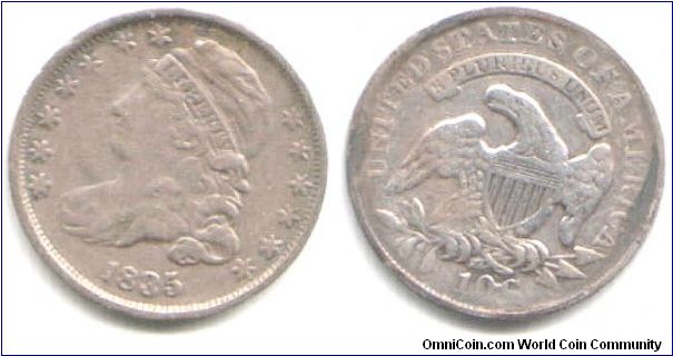 A dime that expertly hides the fact that it was once edge mounted. It seems to me that it was cleaned at one time in its past but has long since retoned excepting on the centre reverse. 

A nice collectable coin none the less.