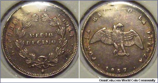Chile 1857 1/2 decimo. Doesn't seem to be common. Strong XF. Sold! 30USD.