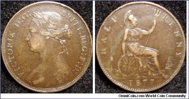 1877 halfpenny
stain on reverse
