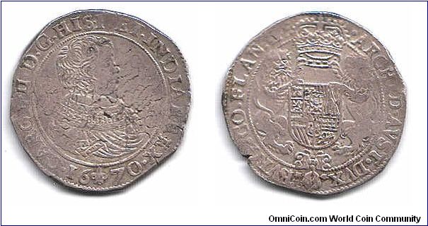 Flanders. Portrait  Ducaton of Carlos II of Spain. Very crudely struck at Bruges. This coin is (believe it or not) almost as-struck!