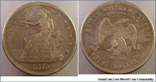1875 S trade dollar type I/I with chop mark on obverse  Reverse 1 berry under left talon Obverse 1 ribbon ends point left