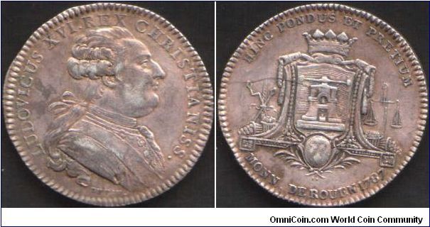 Silver jeton struck for La Monnoye de Rouen (the mint at Rouen). Obverse Louis XVI by Duvivier. Reverse shows screw press in cartouche with other minting paraphernalia.