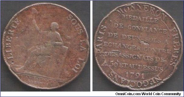 2 sols `Medaille de confiance' issued by the Monneron Freres in Paris. Has seen some action.