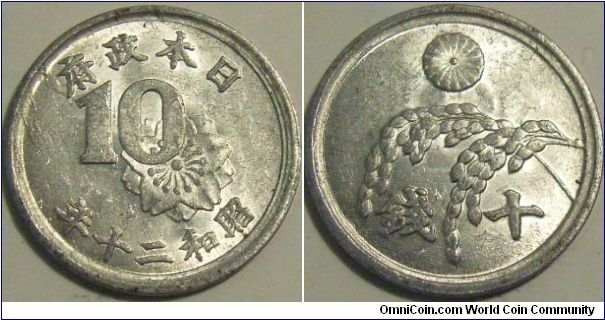 Japan 1945 10 sen. Minor planchet flaw.