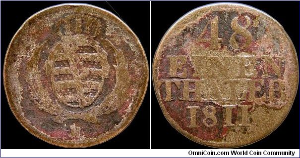 1/48 Thaler, Saxony.

Remains of an old lacquer job from the looks of it.                                                                                                                                                                                                                                                                                                                                                                                                                                         