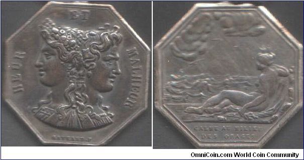 Jeton de Jeu. One of a series of different reverse designs with a common obverse. this one shows the janiform heads of luck and misfortune. The reverse depicts  `calm in the middle of a storm'. These jetons were indeed used as gambling tallies, but they were originally intended as presentation pieces.