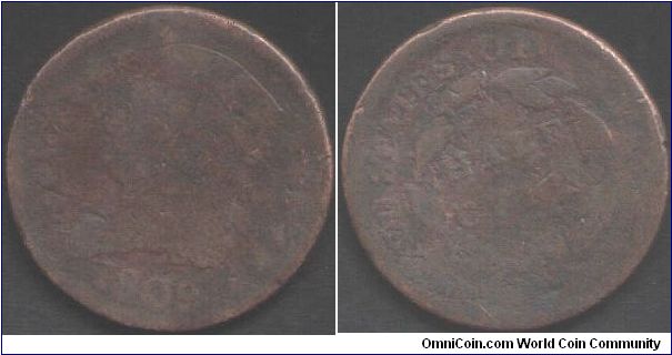 Ugliest Coin contender. An 1809 half cent (small o inside O) but AW grade (almost a washer). Coin is actually ten times better than this scan would have you believe though.