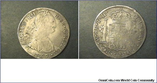 8 Reales T.H.

Upon futher research, this coin appears to be a later cast copy made in silver.