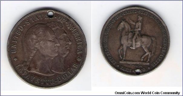 The Only American Dollar Commerative At The Time 
1900 LAyfette
W / HOLE

Update It is A Counterfeit
