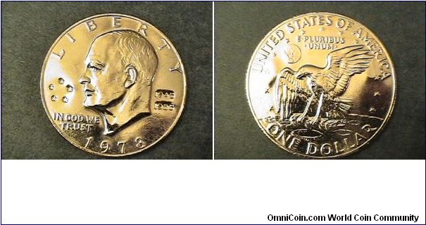 This is an Ike Dollar that has been guilded and counter stamped. To Commemorate th 40th Anniversary of the end of World War II,