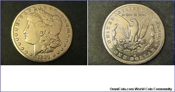 1901 Morgan Silver Dollar, New Orleans Mint, this coin was cleaned by someone, otherwise fine condition