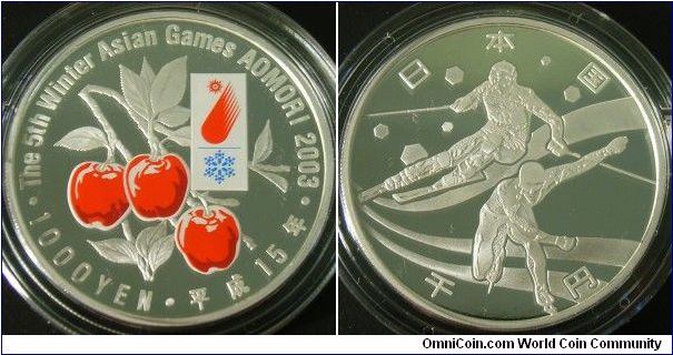 Japan 2003 1000 yen, commemorating the 5th Winter Asian Games in Aomori. First colored coin relesed by Japan and is extremely expensive and difficult to locate. Mintage: 50,000.