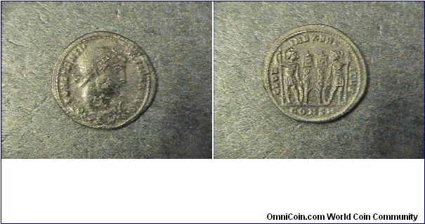 Constantine I 307-337AD (The Great)
Obv:CONSTANTINVS MAX AVG
Rev:GLORIA EXCERCITVS 
CONSM (Constantinople)mint
AE3/19mm