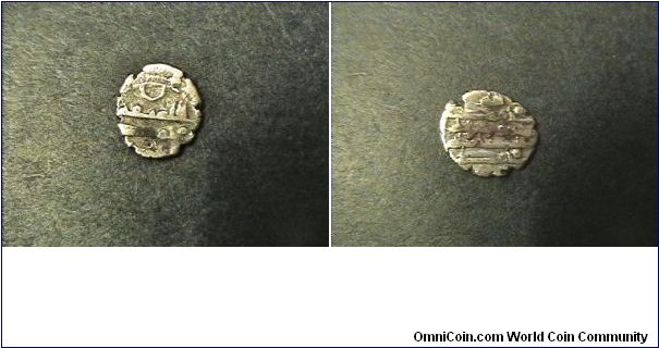 Unknown Islamic coinage Ghaznavids?? circa 10th-11th centuries.
AR/10 mm
.6 gram