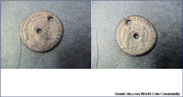 Constantine I 307-337AD
Obv:IMP CONSTANTINVS AVG
Rev:VICTORIAE LAETE PRINC PERP

Billon/Argenteus 18mm 2.6 grams very old holes, prereform issue.