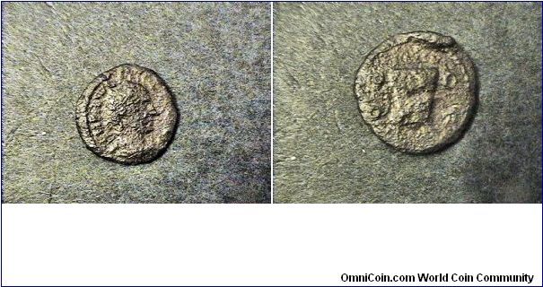 Trajan 98-117AD
Roman Provinical, Deultum,Thrace
Obv:IMP CAE NER TRA AVG GER PM TRPOCOSSIII PP
Rev:CFPD, head of a bull

AE/17mm 2.4 grams