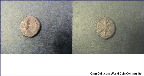 Byzantine Empire
Justin I 518-527AD

Obv: Emperor facing right
Rev: CHI RHO

Pentanummium
AE/13mm 1.5 grams