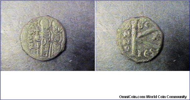 Byzantine Empire
Justin II 565-578AD
Obv:DN IVSTINVS PP AVG
Rev:ANNO X OC
TES mint.
AE/20mm half folles 5.6 mm