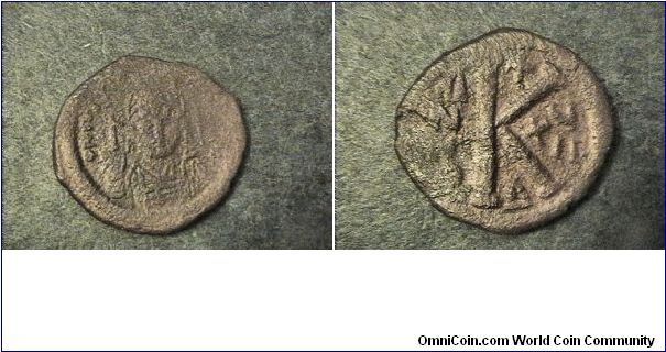 Justinian 527-565AD
Obv: DN IVSTINIAVS PP AVC
Rev: ANNO XIIu
1/2 follis 
AE/27mm 9.5 grams