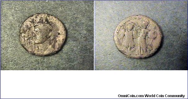 Domitian 81-96AD
Roman Provinical, Judaea Capta, commemorating the suppression of the Jewish Revolt.
Obv:Domitian facing left
Rev: Minerva with armor trophy.
AE/24mm 9.4 grams