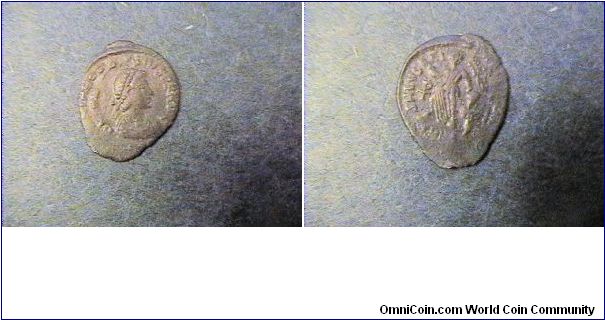Theodosius I 375-395AD
Obv:DN THEODOSIVS PF AVG
Rev:SALVS REIPVBLICAE

Double struck and elongated.
AE/16mm .8 gram