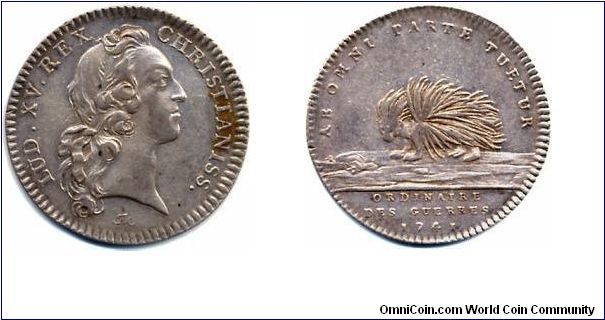 Silver jeton issued for the `Ordinaire Des Guerres'. Older Louis XV obverse, porcupine reverse.