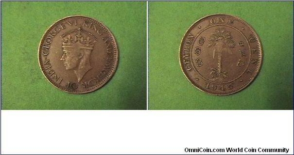 Ceylon One Cent
Obv: GEORGE VI KING AND EMPEROR OF INDIA.

Bronze