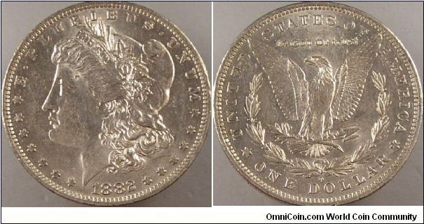 1882 O over S mint mark VAM 3 die. die scratches/gouges in the hair a bit below the ear.