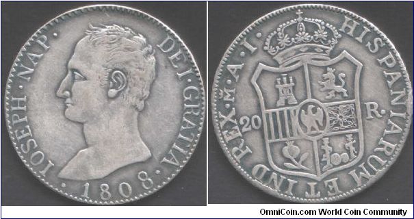 Contemporary fake Joseph Napoleon 20 Reales. The silvering is wearing thin in places (obverse). You can sharpen your detection skills by comparing it with a genuine piece I have in my collection.