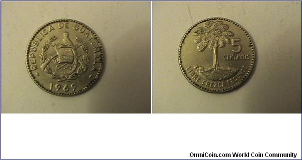 REPUBLICA DE GUATEMALA
5 CENTAVOS
LIBRE GREZCA FECUNDO
copper-nickel