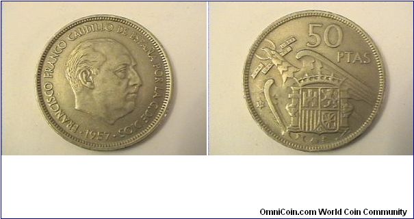 FRANCISCO FRANCO CAUDILLO DE ESPANA POR LA G DE DIOS
50
PESETAS
1957 (59 IN STAR) 
rim: UNA GRANDE LIBRE
copper-nickel