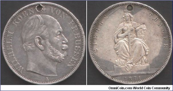 Prussia - 1871A commemorative thaler which someone decided to pierce, otherwise it would have been a nice high grade coin.