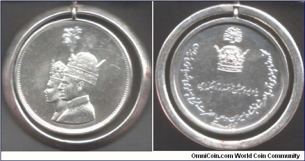 Shah of Iran silver Coronation commemorative medallion in jewellery bezel type mounting.