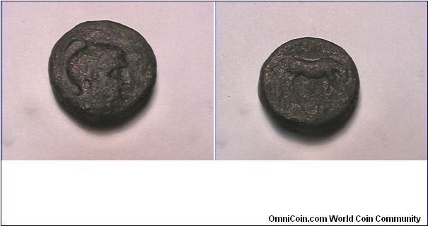 ANCIENT GREEK, BOTTIAEA. MACEDON. Head of Athena wearing crested Athenian helmet. Bull feeding over greek lettering.
bronze
