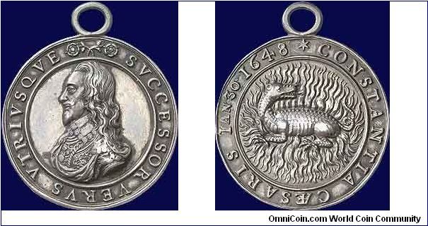 Charles I Death 1649. This medal executed by Thomas Rawlins is to commemerate the fortitude
and consistance of the King. The  Salamander was frequently adopted as
an emblem of fortitude and patience under suffering.

It was common practice for the head of a traitor to be held up and exhibited to the crowd with the words Behold the head of a traitor!; although Charles' head was exhibited, the words were not used. In an unprecedented gesture, one of the revolutionary leaders, Oliver Cromwell