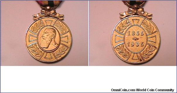 Belgium medal
LEOPOLD II 
1865-1905
gilt-bronze, with ribbon attached.