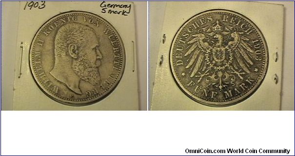 German State Wurttemburg

WILHELM II KOENIG VON WUERTTEMBERG
DEUTSCHES REICH 1903-F FUNF MARK
0.900 silver
rim: GOTT MIT UNS