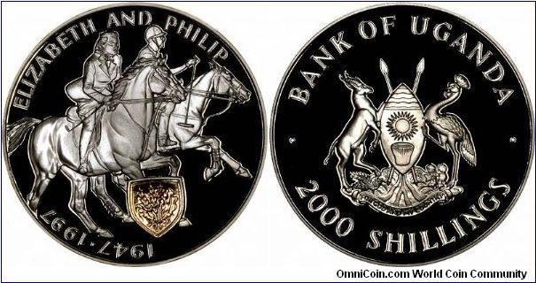 Unusual equestrian portraits of Queen Elizabeth II and Prince Philip on 1997 silver proof 2,000 shillings crown for their Golden Wedding.