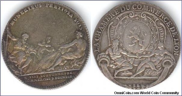 Undated silver jeton of the Chambre de Commerce de Lyon (circa 1723). Rhone and Saone depicted supporting agriculture and siting of Lyon (obverse). Beautiful  and fairly readily available (aka `cheap') jeton. No collection should be without one!