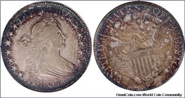 1807 DRAPED BUST HALF DOLLAR (Heraldic Eagle) (O-110a, R.3.)  Die crumbling between the outer points of obverse star seven is diagnostic for this variety. Aquamarine margins frame peach and ruby centers and luster glimmers from the devices and borders.