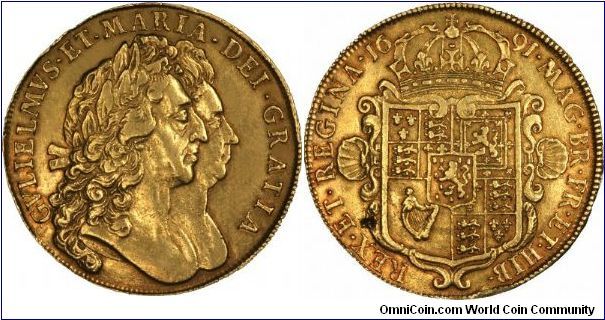 Five guinea piece, Britain's largest and heaviest gold coin, at about 42 grams. Coinjoined portraits of William III and Mary II.
You may also wish to look at our 1687 James II example.